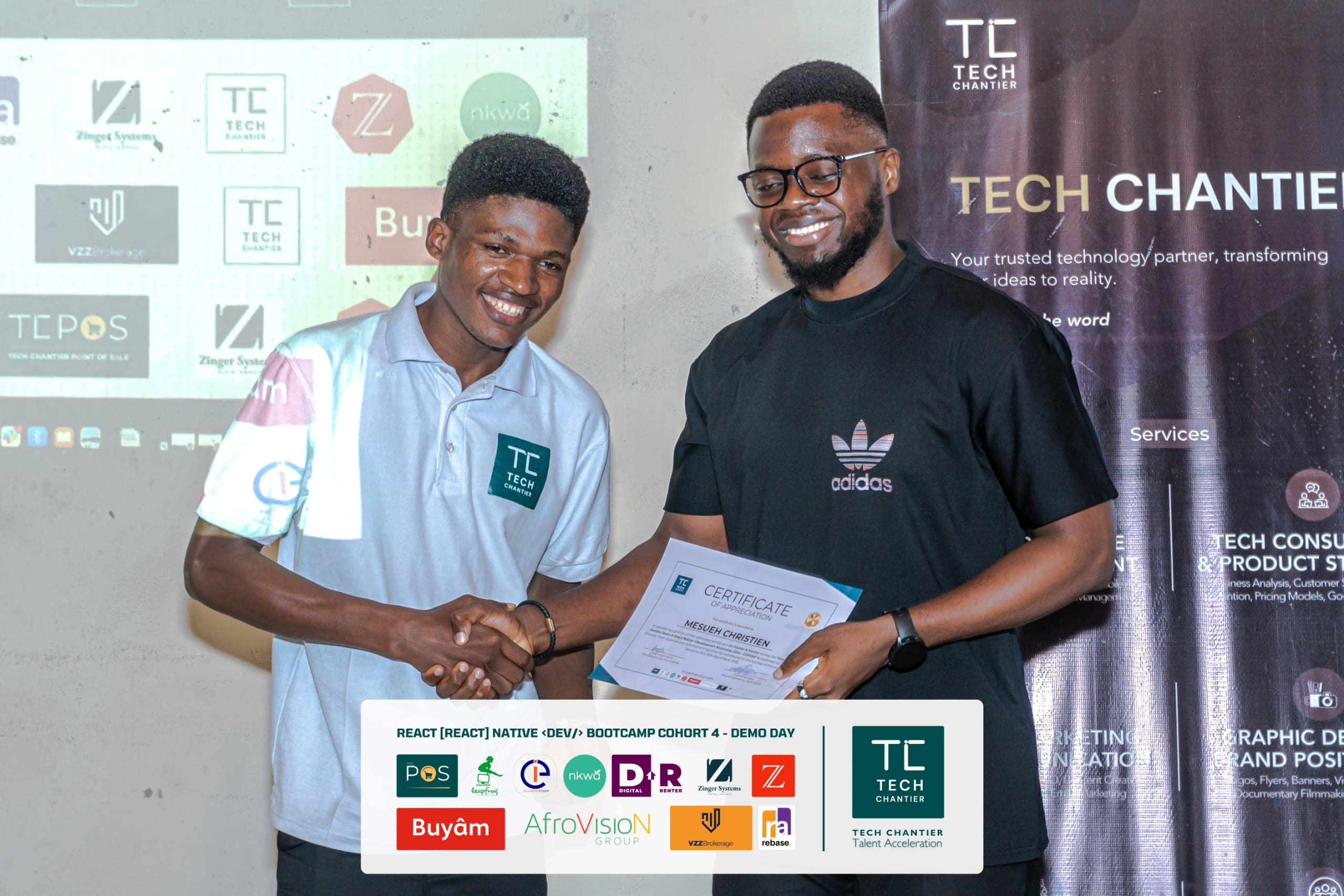 Receiving my certificate at the Cohort 4 Demo Day